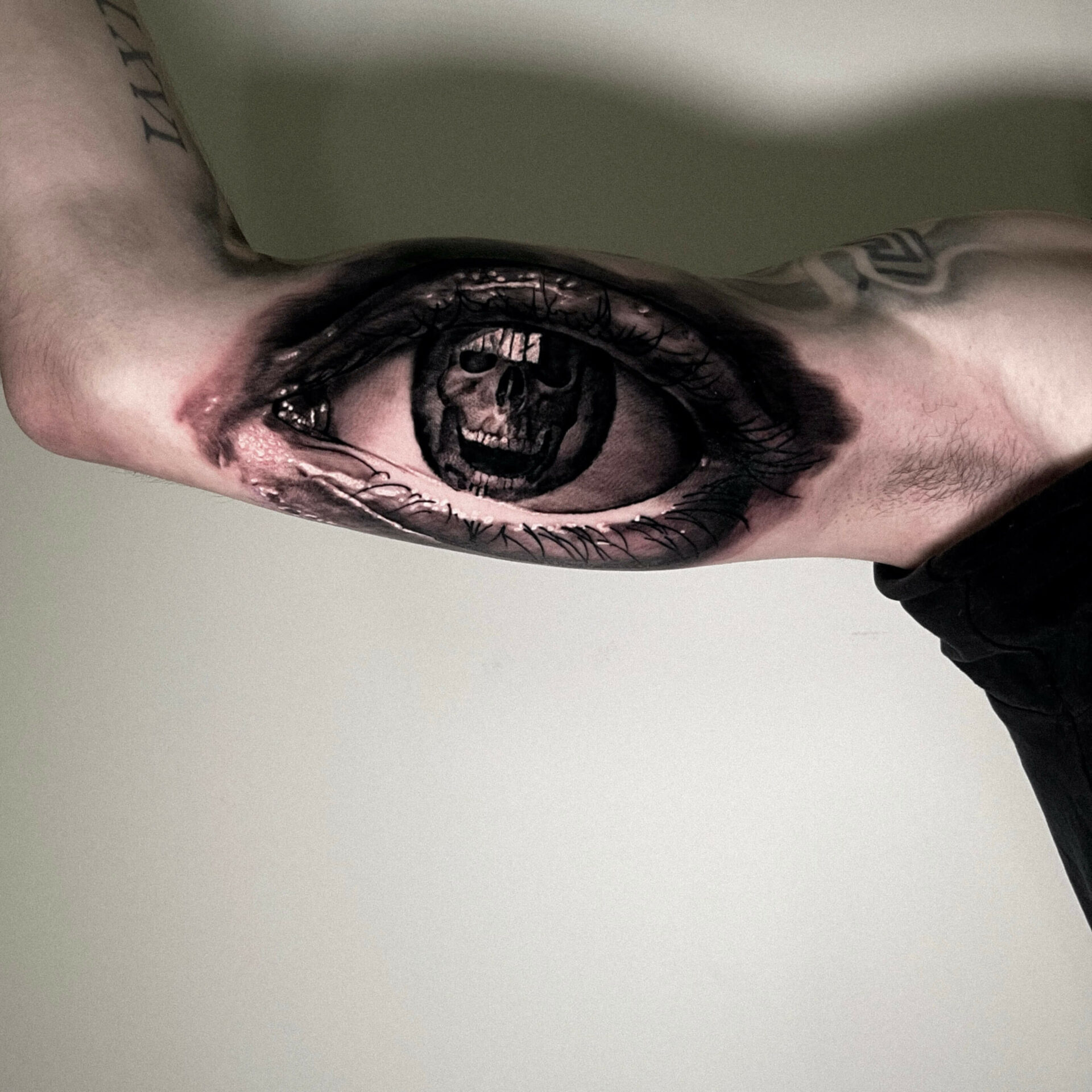 Oleksandr Rudenko tatuaż oko